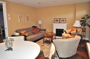This basement has been transformed to a warm cozy rec room